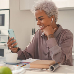 Young woman smiling during video call on phone