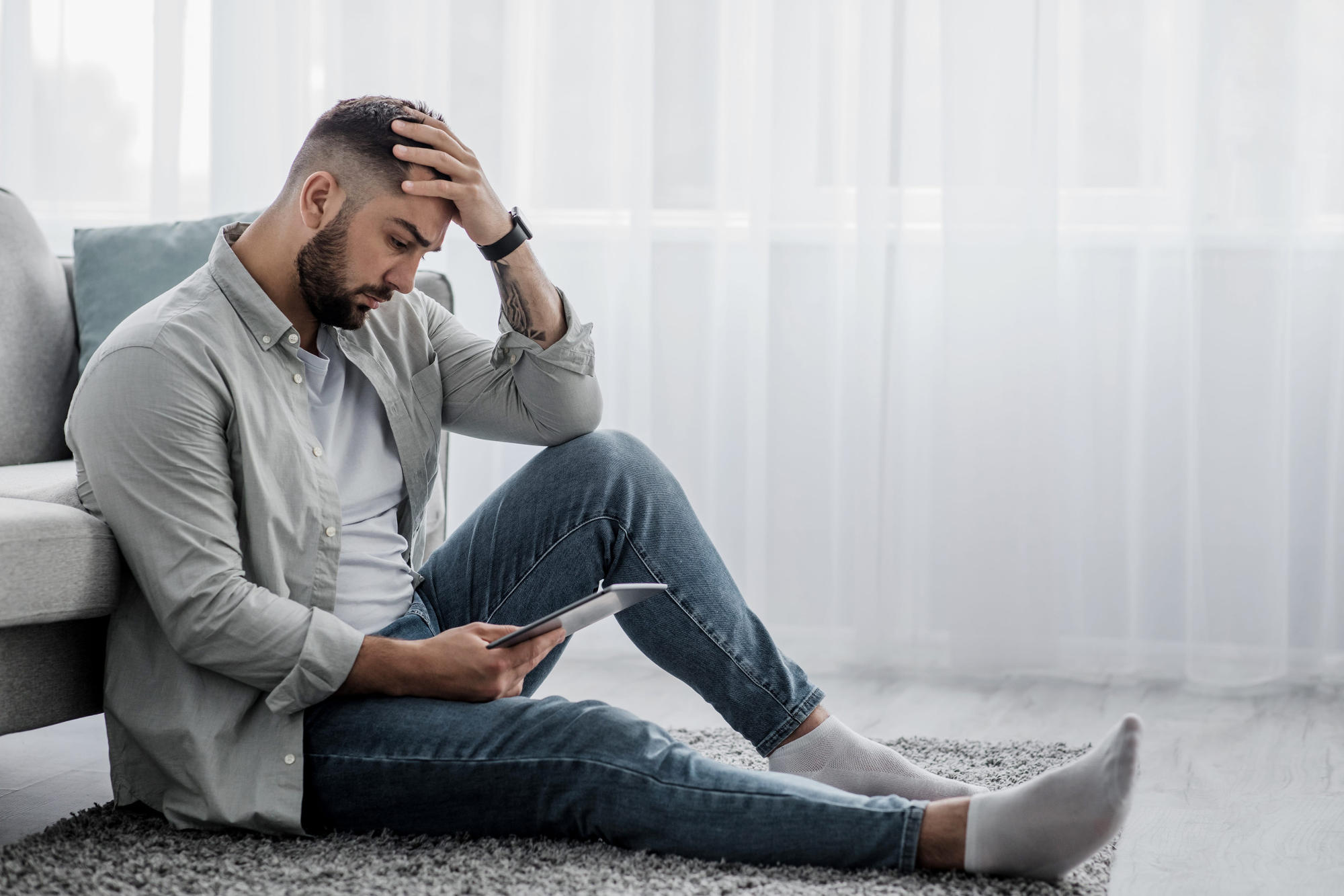 Person experiencing anxiety at home